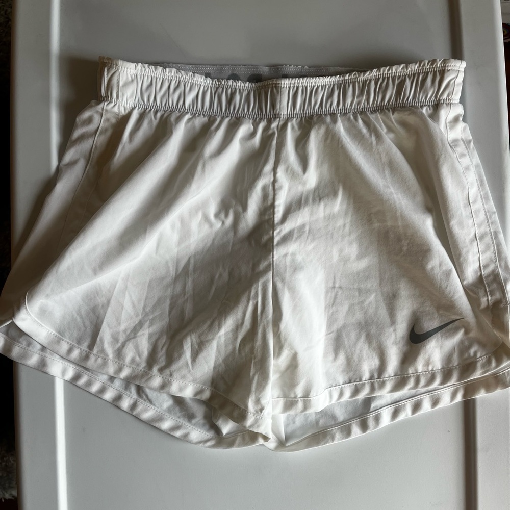 White Nike shorts